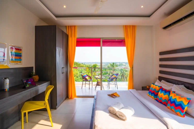 Deluxe Private AC Room with Balcony and Ensuite Bathroom 8