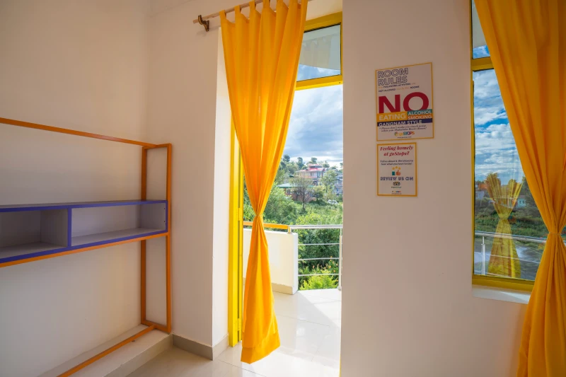 Deluxe Private Room with Balcony and Ensuite Bathroom 4