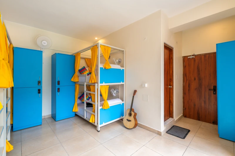Bed in 6 Bed Mixed Dormitory Room with Balcony & Mountain View and Ensuite Bathroom 4